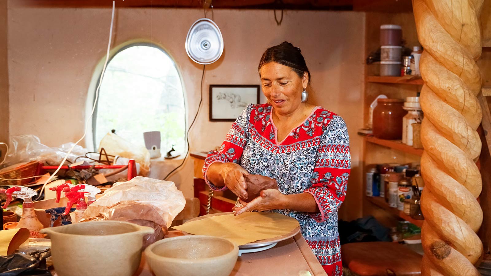 woman-shaping-clay